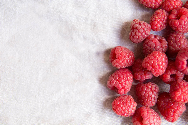 Vitamins. Summer berries. Raspberries background. Close up, top view, high resolution product Harvest Concept - Fotografie, Obrázek