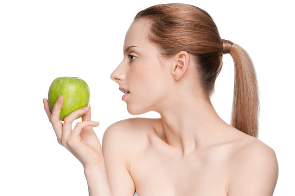 woman eat green apple - Valokuva, kuva