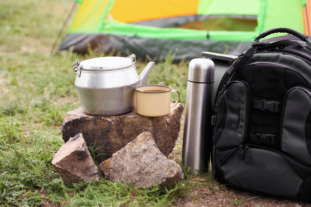 Backpack and set of dishware for camping outdoors - Fotó, kép