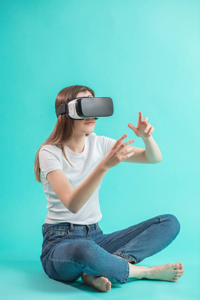 young female touching with virtual reality - Valokuva, kuva