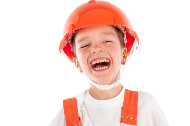 Portrait of boy in orange helmet, insulation - Foto, immagini