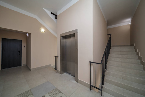 Elevator and stairs up and down in a modern elegant building - Φωτογραφία, εικόνα