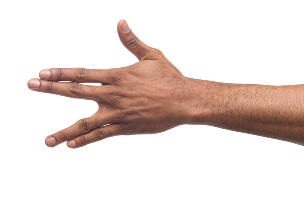 Zwarte man hand gebaren in de vorm van een krokodil - Foto, afbeelding