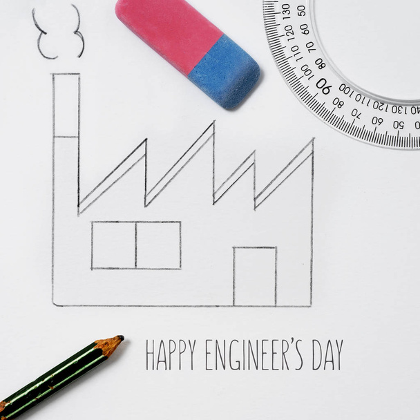 high angle shot of a simple sketch of a factory, drawn by myself, an eraser, a ruler, a protractor, a pencil and the text text happy engineers day - Photo, Image