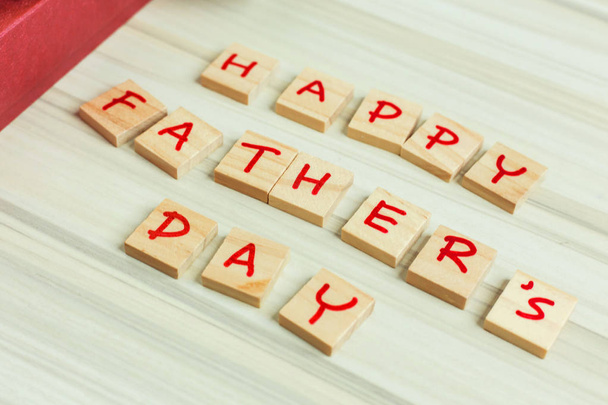 The alphabet on small plate on Blue background  for Father  day image - Foto, Imagen