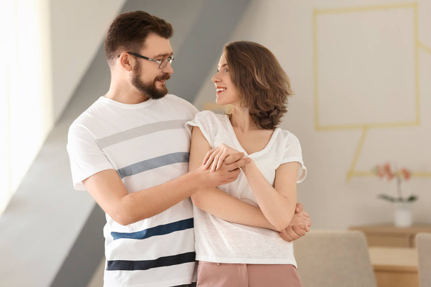Lovely couple dancing together at home - Zdjęcie, obraz