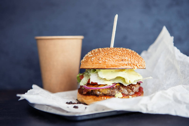 Lunch with street food coffee and burger - Фото, зображення