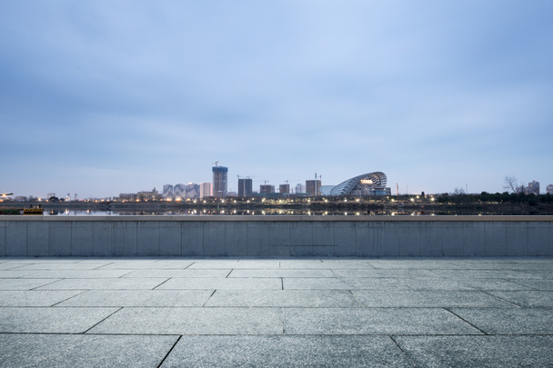 empty ground with modern city skyline - Photo, Image