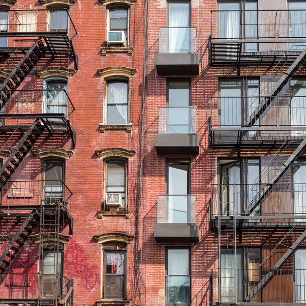 A fire escape of an apartment building in New York city - Zdjęcie, obraz