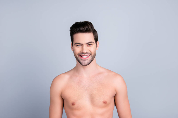 Portrait of unshaven shirtless man with perfect ideal skin isolated on grey background - Zdjęcie, obraz