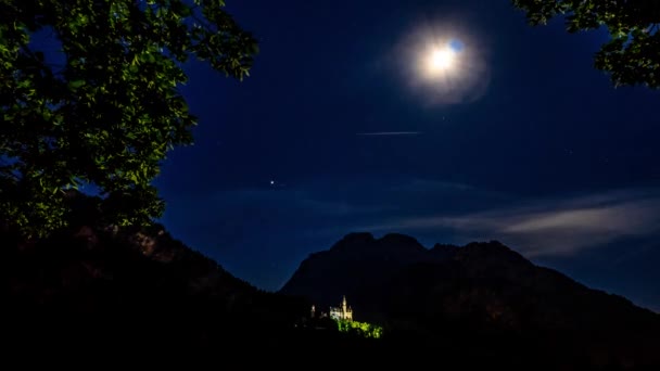 Neuschwanstein Castle, or Schloss Neuschwanstein, is a famous castle in Bavaria, near the city of Fussen, Germany. Night timelapse 4K. - Footage, Video