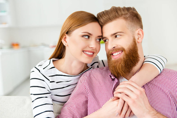 Friendship romantic bearded hipster two people partners feelings coziness lifestyle casual outfit story pregnancy positive concept. Close up portrait of lovely cute sweet lovers looking at each other - Foto, afbeelding