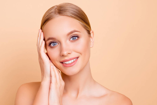 Portrait of lovely pretty charming girl with perfect ideal face skin after procedure enjoying result looking at camera isolated on beige background - Fotografie, Obrázek