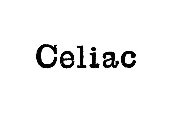 La palabra celíaco de una máquina de escribir sobre un fondo blanco
 - Foto, Imagen