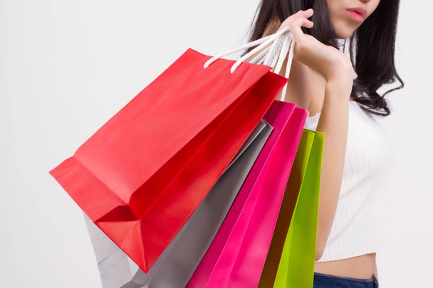 happy smiling girl shopping, excited woman holding shopping bag isolated, smiling girl happy woman shopping colorful bag, asian lady happy shopping concept cute pretty girl beautiful woman asian model - Фото, изображение