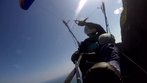 Paraglider pilot, physical handicapped, flying in their own paragliding  - Footage, Video