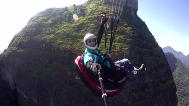 Rio de Janeiro city, Rio de Janeiro State, Brazil South America.12/20/2016Paraglider pilot, physical handicapped, flying in their own paragliding   - Footage, Video
