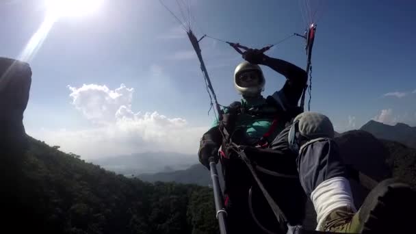 Paraglider pilot, physical handicapped, flying in their own paragliding  - Footage, Video