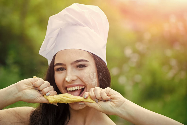 Happy girl in chef hat on summer day - Photo, Image