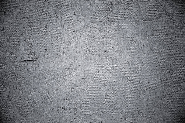 灰色の古い壁のクローズ アップは、石膏で覆われています。灰色の背景 - 写真・画像