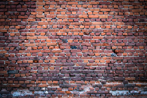 Red brick  old wall with blackened and white bricks , texture grunge background - Photo, Image