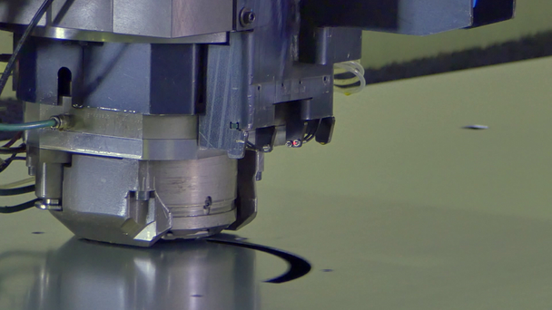 Figured cutting holes stamping of metal sheets on industrial CNC machine. - Footage, Video