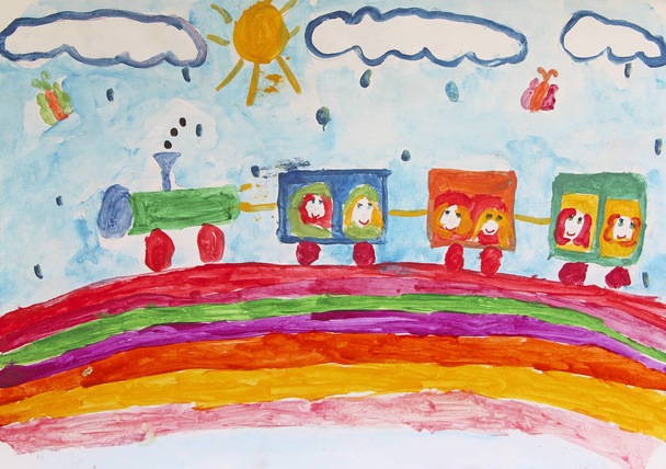 Child's drawing of merry train traveling along rainbow in rain. Funny drawing of child. Children's art. Train painted by child. Colored and bright child drawing. Children's holidays - Photo, Image