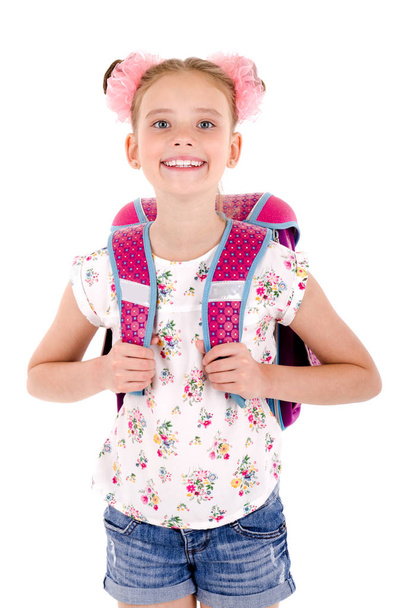 Portrait of smiling happy school girl child with school bag backpack isolated on a white background education concept - Foto, imagen