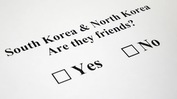Концепція конфлікт або дружби між Північною та Південною Кореєю - Кадри, відео