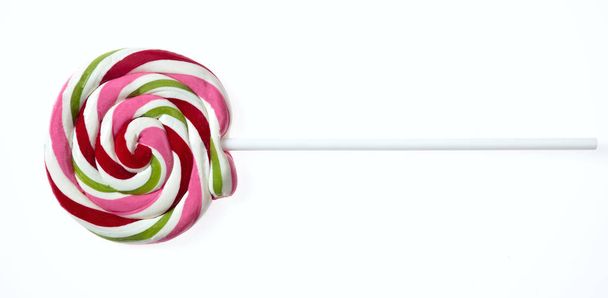 Концепция конфет. Lollipop красный сапфир, пространство для копирования, вырезанный, выделенный на белом фоне
 - Фото, изображение