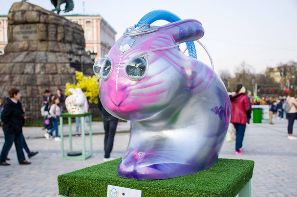 Creative fantastic futuristic alien figure hare or rabbit in purple and pink colors with transparent glass eyes. Beautiful art easter decoration .Kyiv (Kiev), Ukraine, april 2018 - Fotó, kép