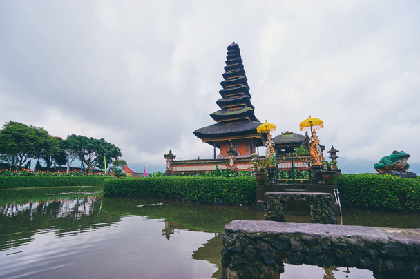 Scenic view of Hindu Temple Pura Ulun Danu on lake Bratan, Bali Indonesia, one of famous tourist attraction. - Fotografie, Obrázek