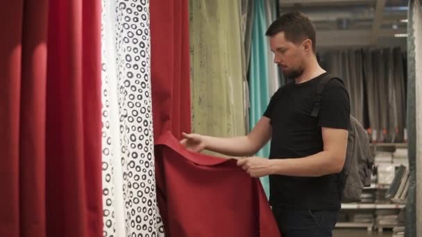 Man checking new curtains. - Footage, Video