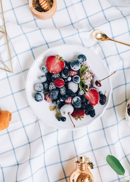 delicious fresh berries, croissant on table, top view - Photo, Image