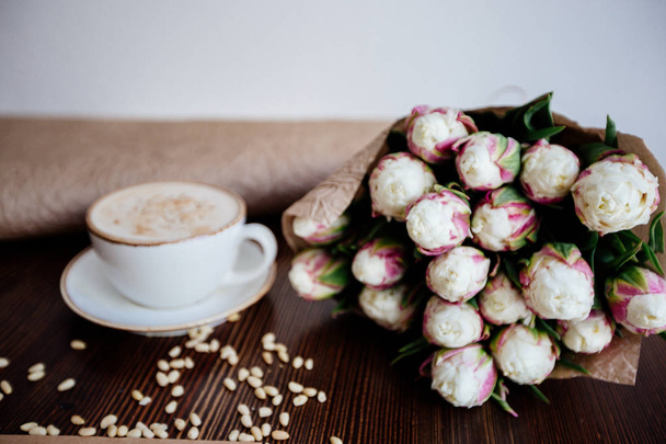 Cappuccino with nuts on the table. - Foto, Imagen