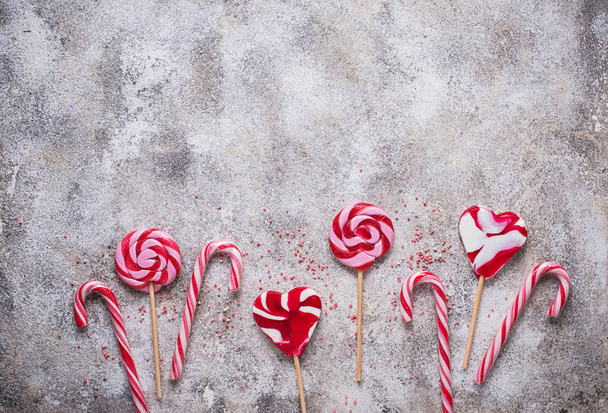 Рожевий льодяник і цукерки тростина
  - Фото, зображення