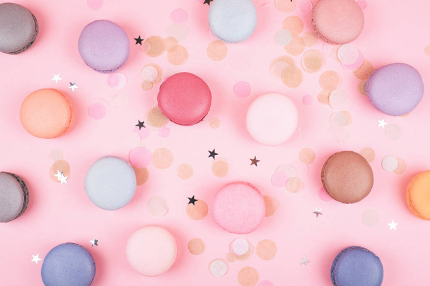 Group of pastel colorful macarons on trendy background - 写真・画像