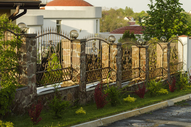 forged fence along the road - Photo, Image