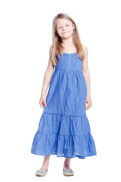 Full length portrait of cute little girl in blue dress - Фото, зображення