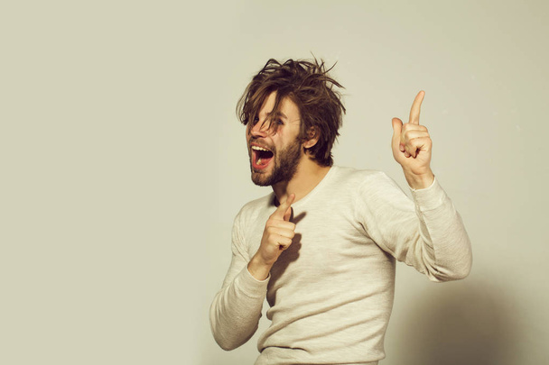 upset man happy man with long uncombed hair wake up in morning - Foto, Imagem
