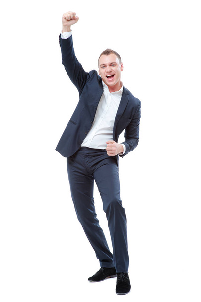 Full length of happy young man in formalwear celebrating, gesturing, keeping arms raised and expressing positivity - Photo, Image