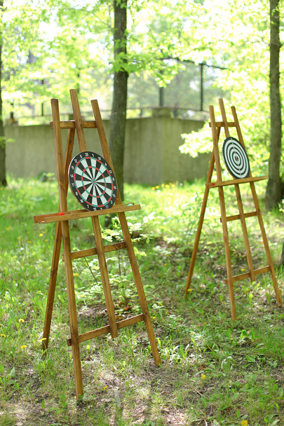 Darts targets on easels in garden. - Photo, Image