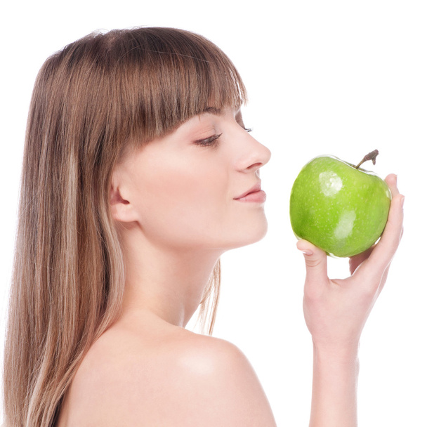Young woman with green apple - Foto, Imagen