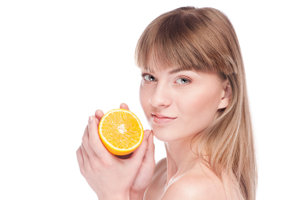 Young beauty woman with orange - Fotoğraf, Görsel