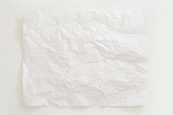crumpled white sheet on white background - Фото, зображення