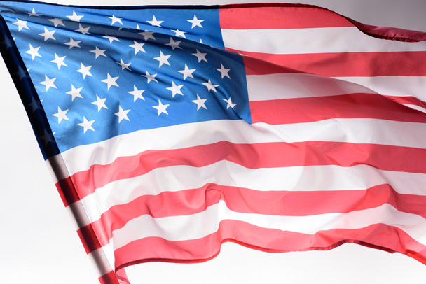 close-up shot of waving united states flag on grey, Independence Day concept - Φωτογραφία, εικόνα