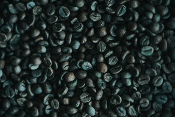 Close-up beeld van geroosterde natuurlijke koffiebonen textuur - Foto, afbeelding