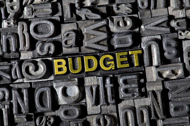 full frame image of iron letters and German word for budget  - Foto, Imagem