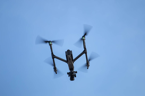 Professional heavy duty drone flying in the air. - Photo, Image