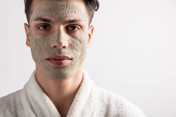 Youthful male is having facial procedures - Foto, Imagem